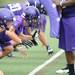 Pioneer High School football players run a drill during the first day of practice on Monday, August 12, 2013. Melanie Maxwell | AnnArbor.com